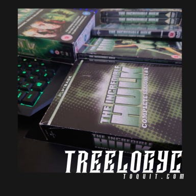 A collection of "Hulk" DVDs on a desk with a keyboard in the background.